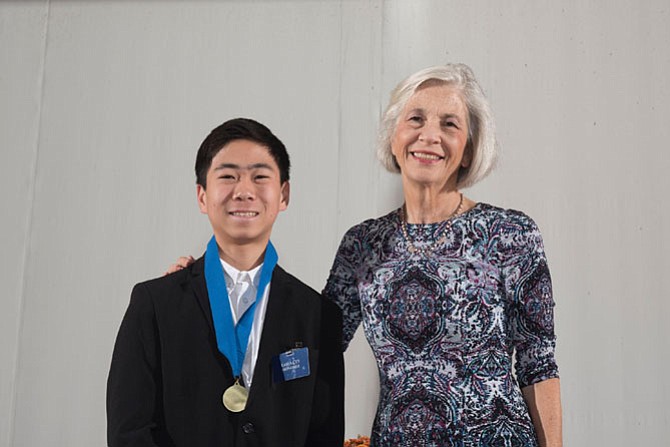 Justin Hu at the Johns Hopkins Grand Ceremony with Elaine Tuttle Hansen, executive director of Center for Talented Youth.
