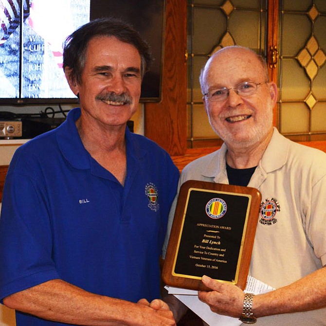 Bruce Waxman (right), Chapter 227 president, presents the Member of the Year Award to Bill Lynch. 