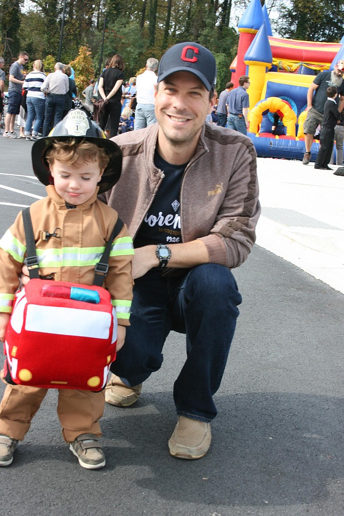 Chris Hemmerlein and son, Teddy, at Pumpkinfest.
