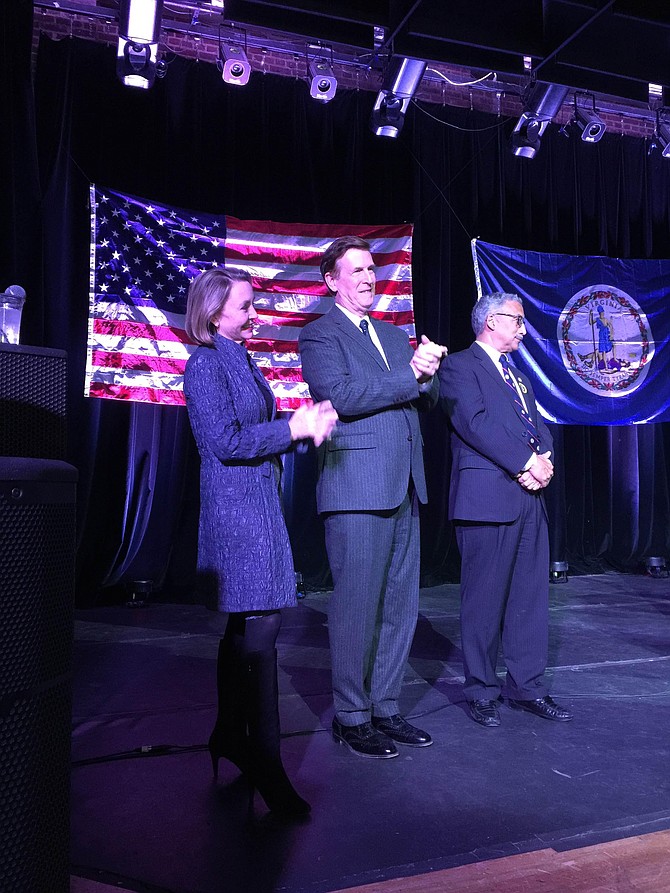 U.S. Rep. Donald Beyer (center) with his wife Megan Beyer (left) and U.S. Rep. Bobby Scott at an Election Night party held in the State Theatre in Falls Church.