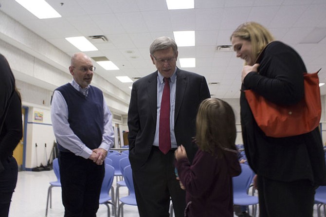 (From right) Karen Caruth, mother of first-grader Cleary Caruth, thanks Dranesville District Supervisor John Foust, and Bob Fuqua, the school’s principal, for making progress on the sidewalk projects. Foust told Cleary to email him photos of her riding her bike on the sidewalks once they are finished.
