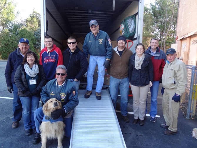 The Knights of Columbus delivering Thanksgiving food boxes and turkeys last year for WFCM’s Holiday Food Program.
