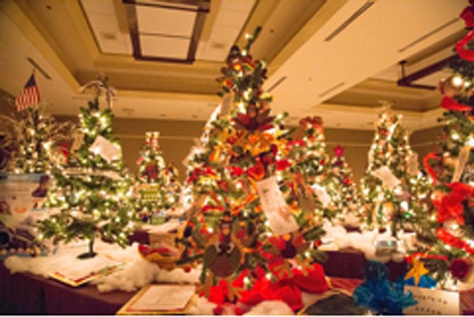 ‘The Enchanted Forest’ features a beautiful ‘forest’ of more than 100 theme-decorated holiday trees.
