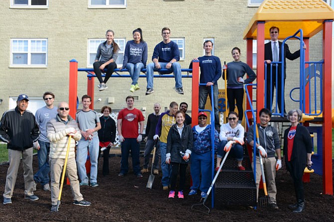 More than a dozen volunteers from the consulting firm Accenture spent the afternoon on Nov. 11, Veterans Day, improving the grounds at Huntington Gardens residential community.