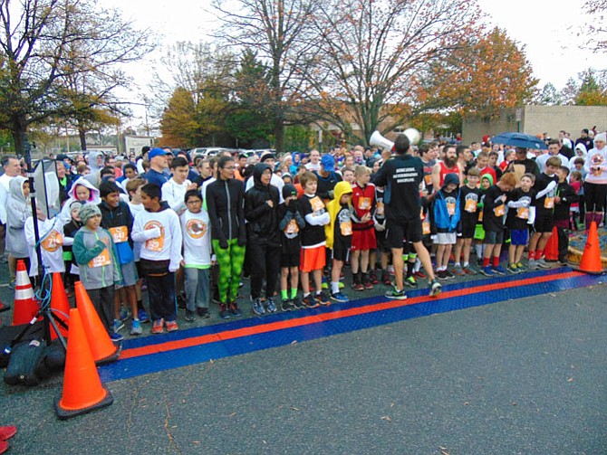 Runners at the start of The Herndon Turkey Trot 5K race at the Herndon Community Center on Saturday, Nov. 19, 2016.
