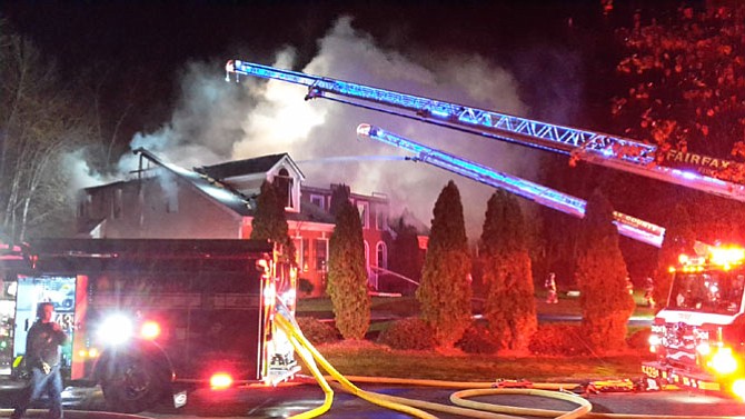 Fairfax County firefighters respond to a house fire at 1065 Northfalls Court in Great Falls at 2:33 a.m. on Sunday, Nov. 20.
 
