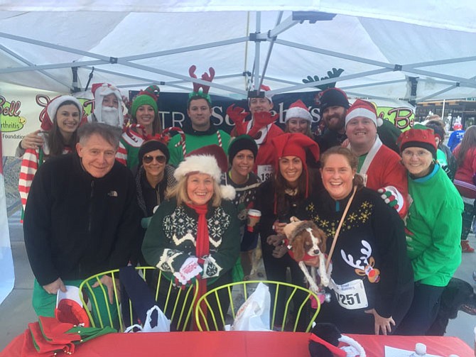 Garrett Golubin, second from right, poses for a photo with members of Team Golubin United Against Arthritis at last year’s 5K Jingle Bell Walk/Run for Arthritis at Pentagon Row. This year’s event will take place Dec. 3 and hopes to raise more than $110,000.