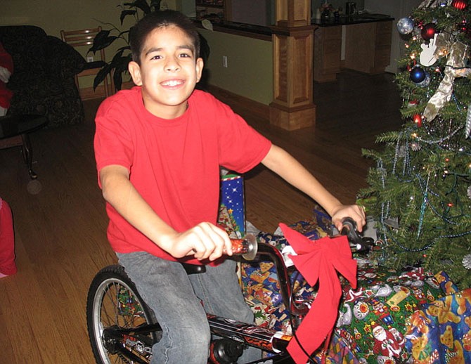 This boy received a bike from an Our Daily Bread donor in a previous year.
