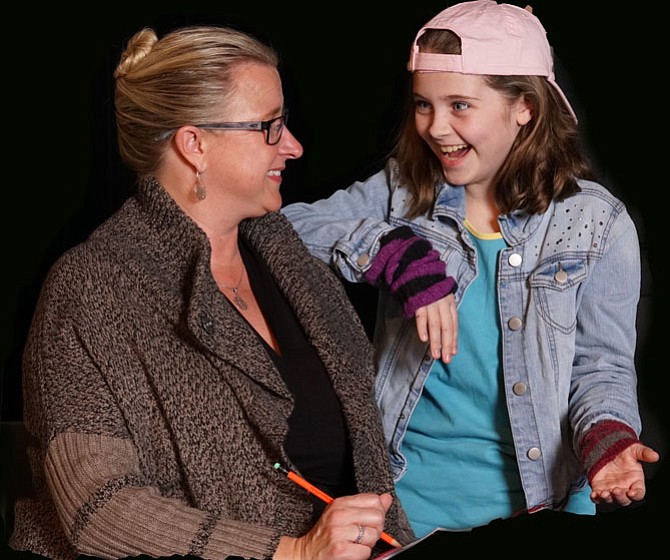 Michelle Shader who plays Mrs. Bradley and Erika Friel as Gladys Herdman in a scene from the Providence Players production of Barbara Robinson’s holiday classic ‘The Best Christmas Pageant Ever.’
