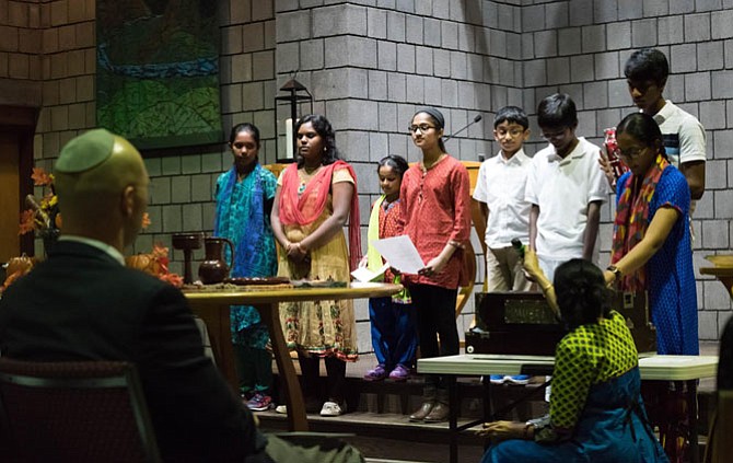 The Nov. 22 service featured traditions of prayer and musical performance from Christianity, Islam, Hinduism and Judaism, including individual groups from the participating faith communities and a combined choir.


