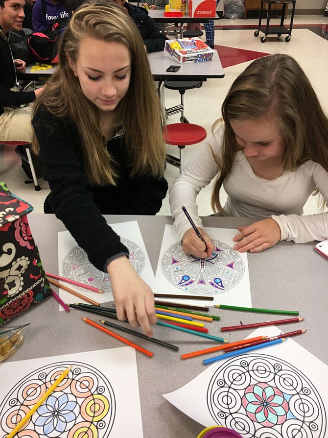 Multiple times throughout the week, kinesthetic relaxation activities such as coloring, board games and Play-doh construction are available for the students.