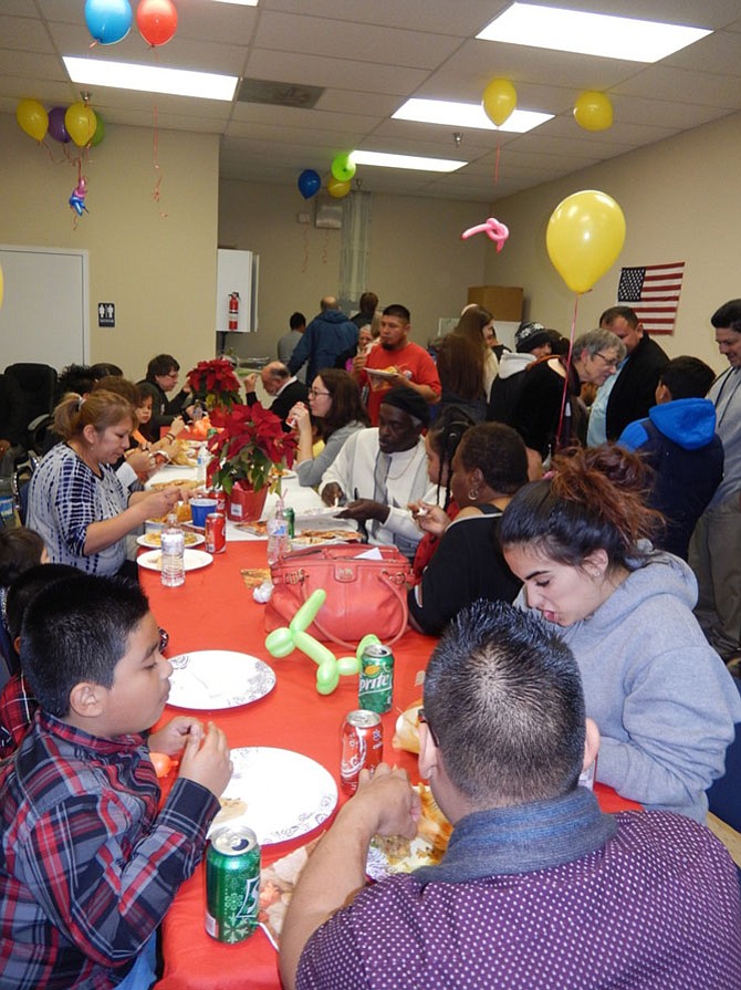 Attendees enjoy the anniversary meal together.