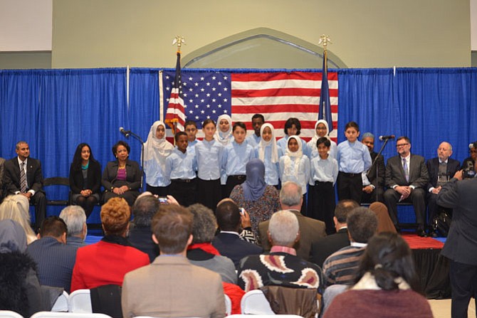 Children from the ADAMS choir helped open and close the event, singing songs of peace to start the program, and ending with “America the Beautiful.”