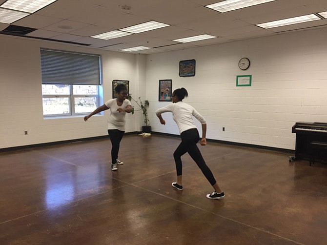 Rhea Turner (left) and Amiya Williams (right)  perform their original choreography at the casting call.