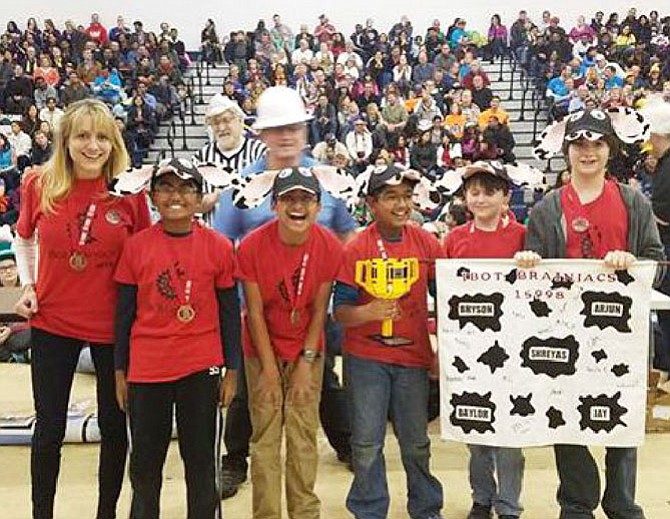 A team of current and former Lorton Station Elementary students won top honors in the FIRST Lego League Robotics state tournament.  