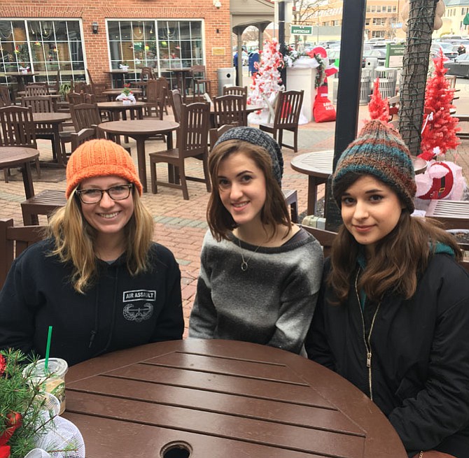 Rose McKinnon, Abbie Olshin and Elena Olshin sit outside the Potomac Starbucks and talk about resolutions for the new year.