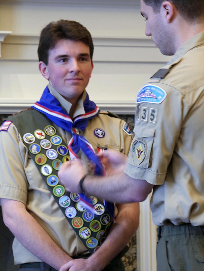 Thomas Pollack receives his Eagle Neckerchief in a ceremony Saturday Jan. 7 at the Army-Navy Country Club. He began Scouting at 6 years old.