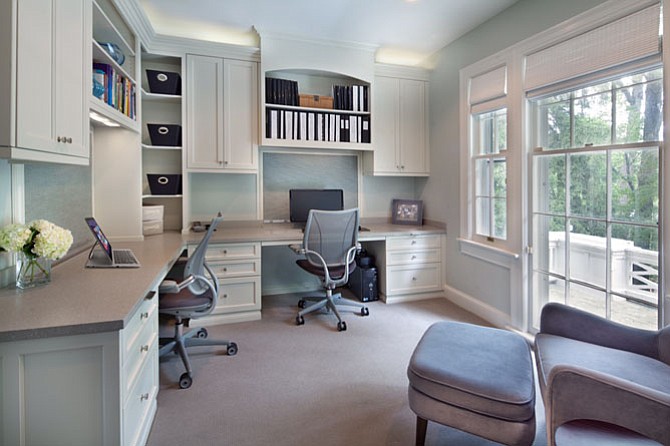 This new home office by Anthony Wilder Design/Build incorporates a custom-designed cord control system.