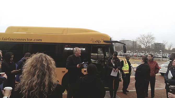 On bus tour of completed, pending and future projects hosted by state Sen. Dave Marsden (D-37), center, a group of legislators and transportation organization leaders explained how thanks to a landmark bill that passed out of the General Assembly three years ago, there is hope for a more effective transportation network.