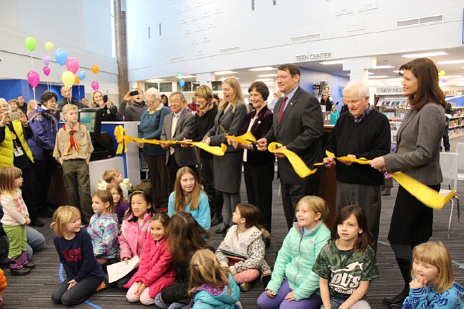 Official Ribbon Cutting at Pohick Regional Library. Center: Jessica Hudson, Fairfax County Library Director, Sharon Bulova Fairfax County Chairman, and Pat Herrity, Springfield District Supervisor.
