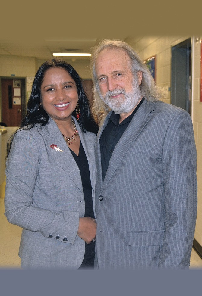 Centreville High guitarists and performers will present the 30th Gumbo Concert on Friday, Jan. 27, under the direction of CVHS’s director of guitar studies Bill Burke. With him backstage at a previous Gumbo Concert is his wife Naila. 
