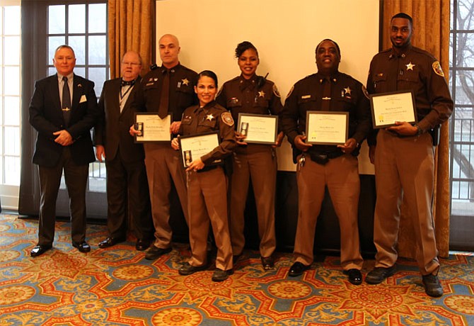 From left are John Blair, Public Service Awards Chairman; Paul Walden, George Washington Chapter President; City of Alexandria Deputies Joseph Runquist, Myma Juarez, Cinie Bearden, Manuel Lee and Devon Neckles.