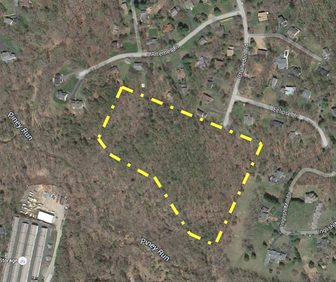 The property is an undeveloped, forested 11-acre parcel that is currently accessed from the north via Challedon Road, a paved Virginia Department of Transportation-maintained road. Challedon Road runs northward, to connect to Brevity Drive, which runs westward to connect to Springvale Road. There is a temporary cul-de-sac where Challedon Road ends.