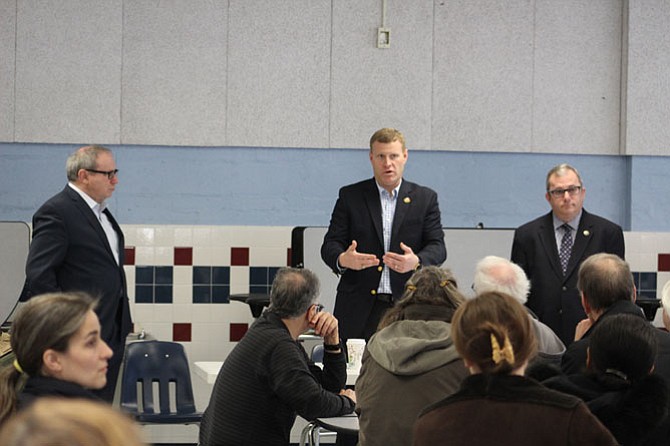 Del. Mark Sickles, Lee District Supervisor Jeff McKay and state Sen. Adam Ebbin at the Jan. 28 town hall meeting at Hayfield Elementary School.