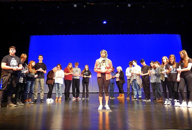 The townspeople hold a vigil for Matthew Shepard during Westfield High’s production of “The Laramie Project.”