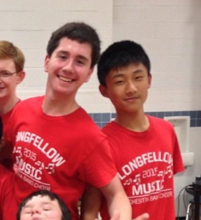 Friends Mark Bosset, left, and James Chen, right, sang together in middle school and were classmates at Langley High School. The day this photo was taken, Chen sang a solo to Billy Joel’s “Uptown Girl,” which Bosset says will always remind him of his friend because it was done so well.  “All of us miss him and will never forget singing along with him.”
