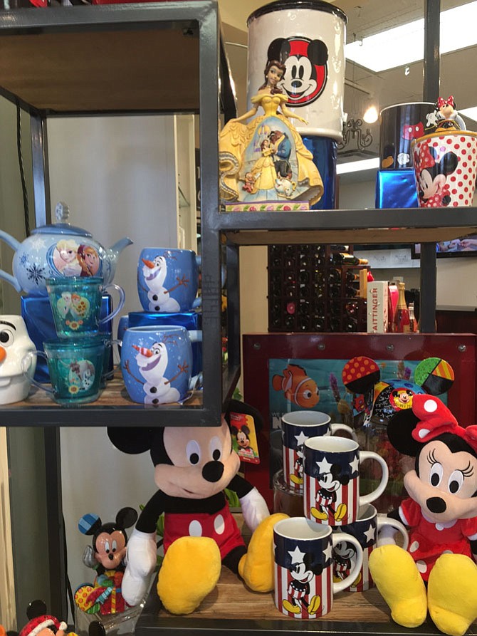 Playful Disney accessories, from “Frozen” drinking cups with swirling glitter to a large Anna and Elsa teapot, call to kids at Karin’s Florist. Fill the cup or teapot with “conversational” candies for the kids in your lives. Cup sells for $7.99.
