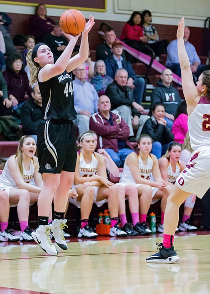 Tori Martin l#44 aunches a 3 pointer versus Oakton