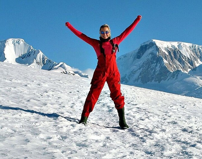 Brooke Curran, shown after completing the Antarctica Marathon, raises money for children’s charities through The RunningBrooke Fund.
