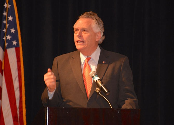 Gov. Terry McAuliffe addresses the attendees at the 25th annual Northern Virginia Economic Conference, noting the Commonwealth’s advancements in job growth and in certain segments of the state’s economy. “We’re number 5 in wine production. When I’m done, they’ll think Napa is an auto parts store,” he told the crowd. The governor also expressed his concerns about the new administration’s immigration policies and the negative effects on business in Virginia and elsewhere. 