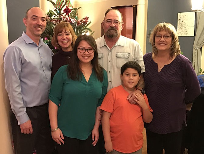 Back row, from left, are Joe Nguyen, Tina Diep Carmichael, and Doc and Keri Carmichael; (front row) Tina’s children, Cindy and Bryan Diep.