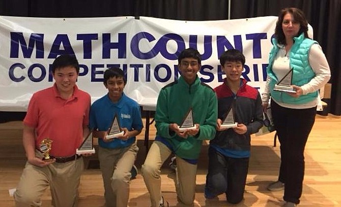 The Nysmith “MATHCOUNTS” team, from left: Whitman Ochiai, Anand Advani, Anuraag Kaashyap, Kaien Yang and coach JoMarie Broccoli.