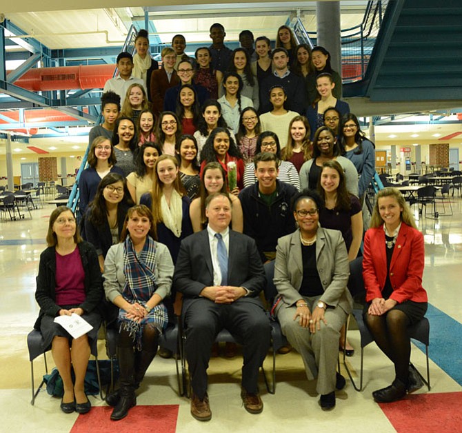 Twenty-five students, two faculty members, and the keynote speaker were honored at the annual induction ceremony of the T.C. Williams High School’s chapter of the National English Honor Society.