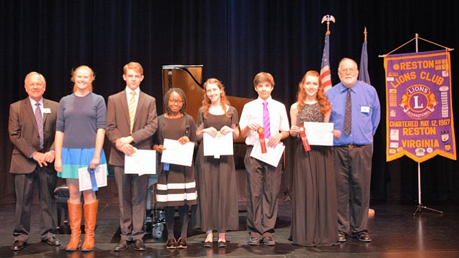 From left are Lion Steve Reber, chairman; Ruth Miller, George Mason High School; Robert Kichenbauer, Washington Lee High School; Ashley Andoua, James Madison High School; Lauren Spar, South Lakes High School; Jasper de Boor, Washington Lee High School; Rebecca Williamson, Dominion High School; and Lion Patrick McCann, Reston Lions Club president.