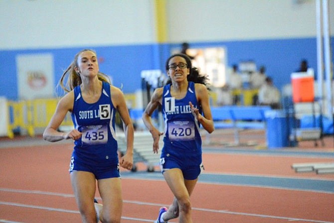 Aly Rayle and Mary Gregory compete in the 500 Meters at the 6A North Region Meet on Feb. 15.