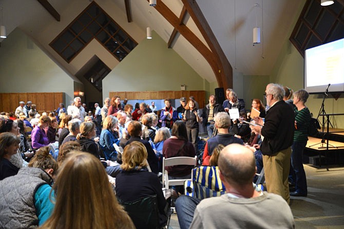 The Herndon-Reston Indivisible attendees break into interest groups to work on specific issues.
