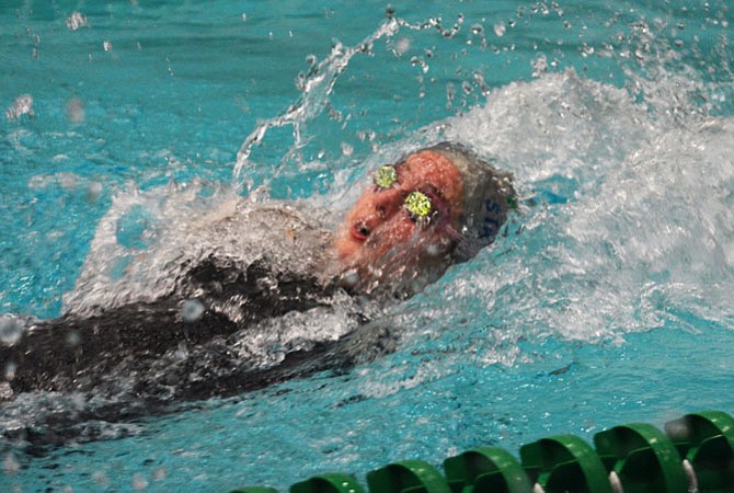 Anna Redican swims to a second place finish at the VHSL 6A Championship meet with a school record-setting time. "Breaking a record any time is great — doing it in my first year (at SLHS) makes me excited to see what I can do over the next three years," she said of her time.