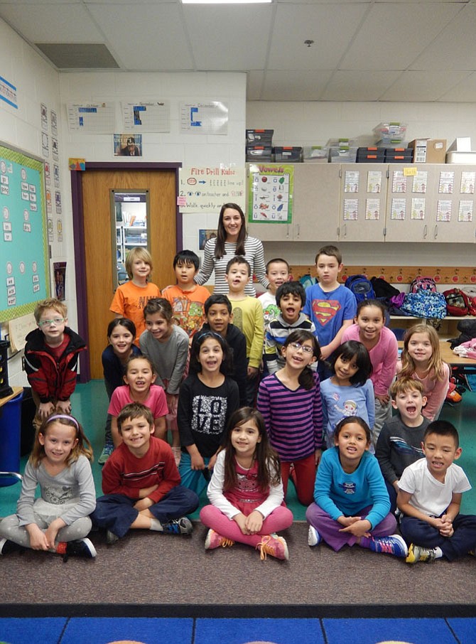 Guided by teacher Vicky Novak (in back) these Daniels Run first-graders created “American Ninja Warrior”-style obstacles to learn about shapes.