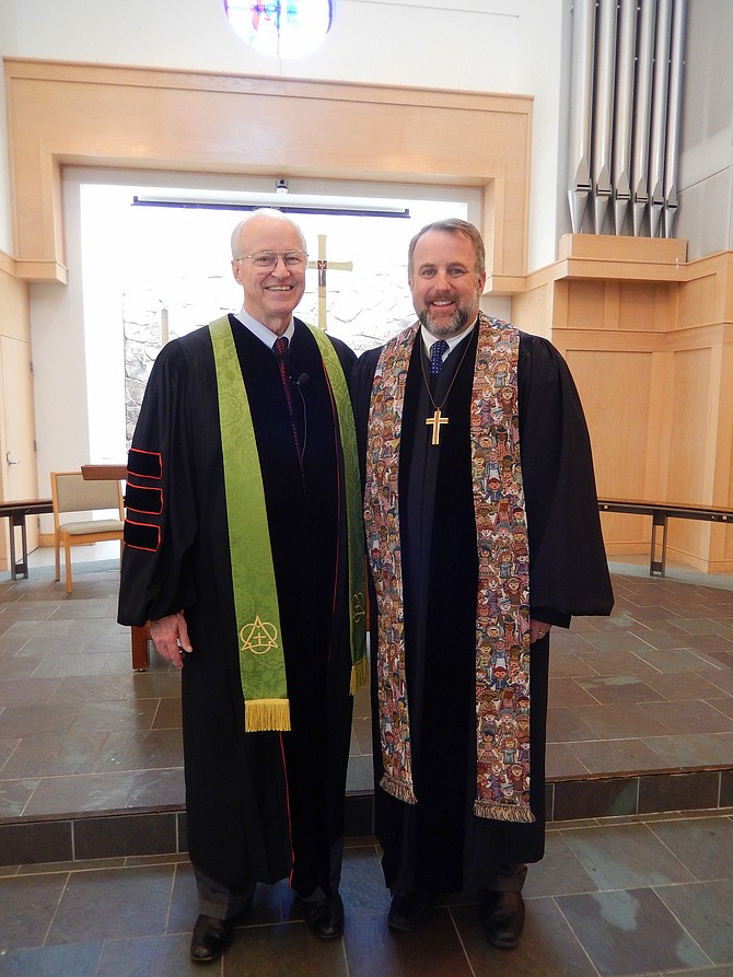 Centreville United Methodist Church pastors Bert Sikkelee (left) and Will Montgomery inside the church sanctuary.