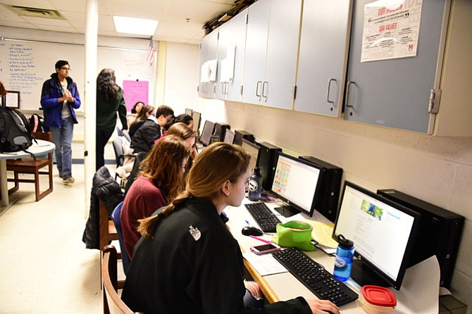 McLean high school students work on stories for “The Highlander” magazine in a print journalism class. Lindsay Benedict is the journalism teacher at McLean High school. 
