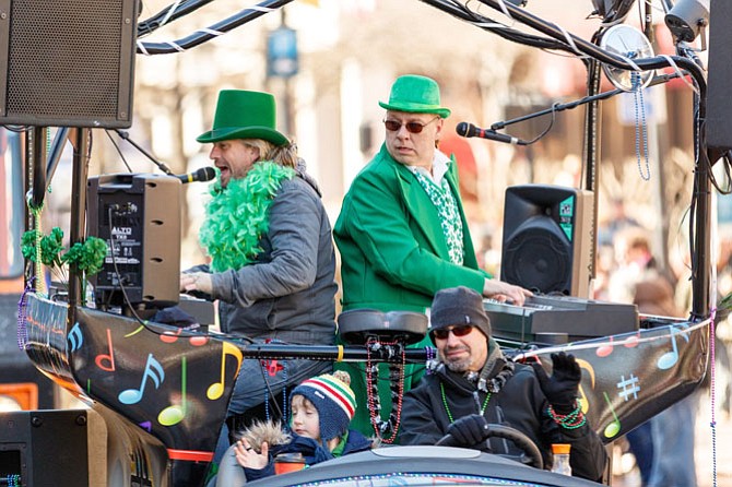 The Bobby McKey's Dueling Piano Bar in the Ballyshaners Saint Patrick's Day Parade in Alexandria, VA on Mar 4, 2017.  (Photo by Mark Mogle)