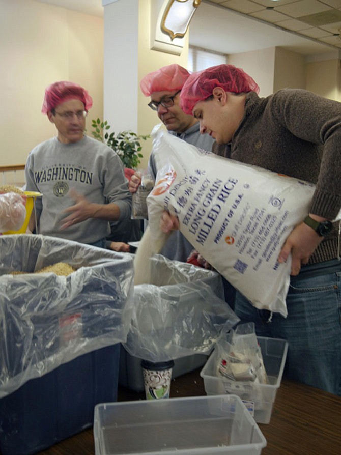 Keeping the rice bins filled for the assembly line 