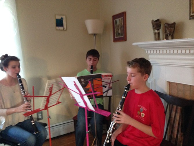Fifteen-year-old Timothy Gulyn plays Christmas music with fellow clarinetists. His teacher brings together all her clarinet students to perform with each other several times a year.