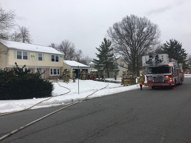 Firefighters respond to a house fire in the 4200 block of Plaza Lane.