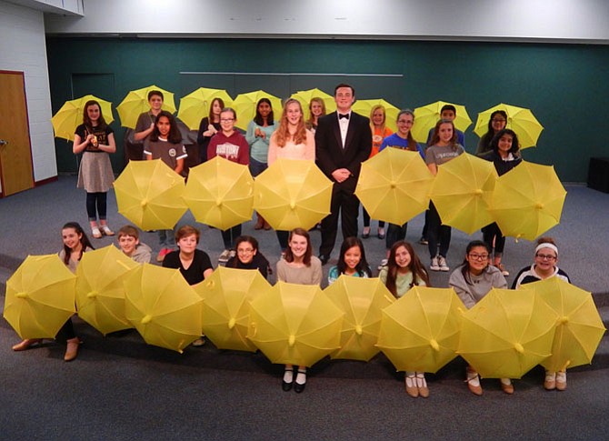 The cast members who’ll be performing in the show’s title number, “Singin’ in the Rain.”