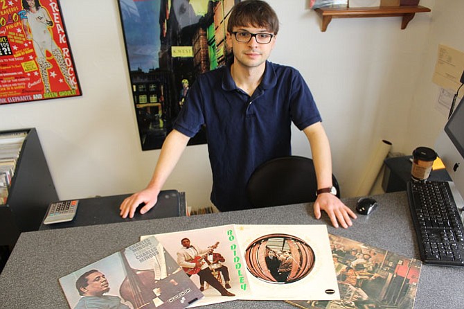The Right On! Records owner Garin Pappas pulls a selection from his collection to play in the store (from left): Bo Diddley, Charles Mingus Jr., Captain Beefheart and his Magic Band and Bob Dylan.